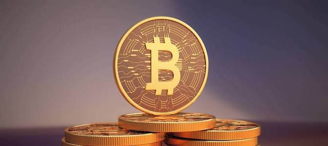 Physical bitcoin tokens illustrating the cost of buying bitcoin at an ATM